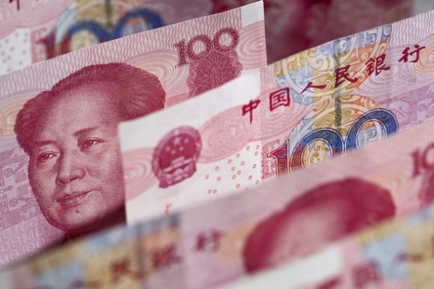 Китай запустил фьючерсы на нефть в юанях